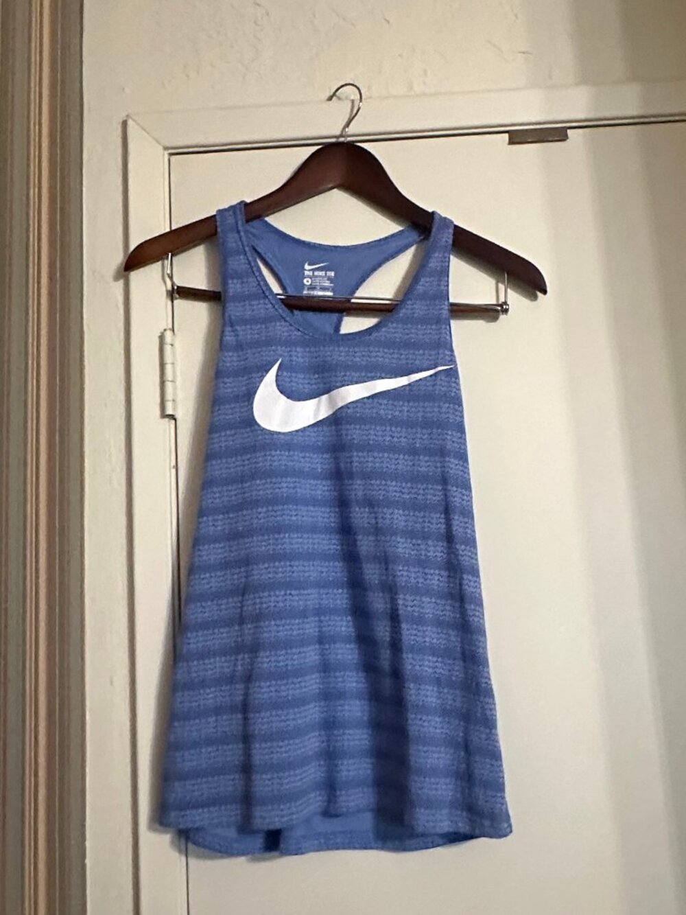 Nike racerback tank top, light blue and dotted, size medium